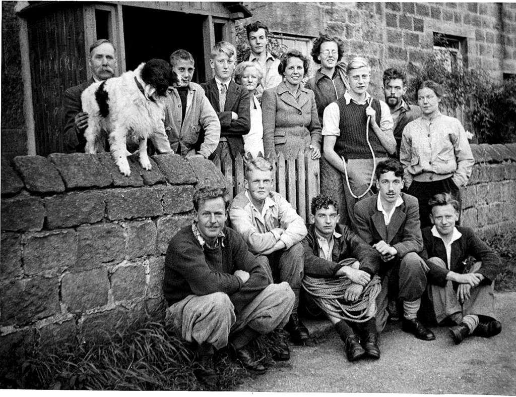 A group of more than a dozen young rock climbers outside a farm in Yorkshire. Denys is towards the right at the back of the group.