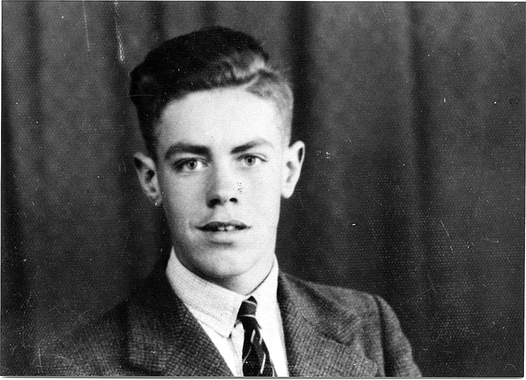Portrait of Denys Fisher as a teenager wearing his Roundhay School tie
