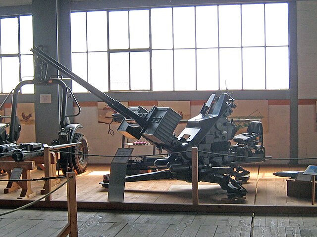 A Hispano-Suiza 20mm anti-aircraft gun on display in a museum.